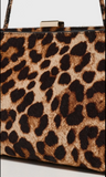 zella covered frame clutch